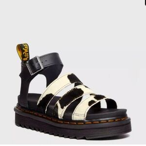 Size 9 (woman’s) Dr. Martens cow print shoes